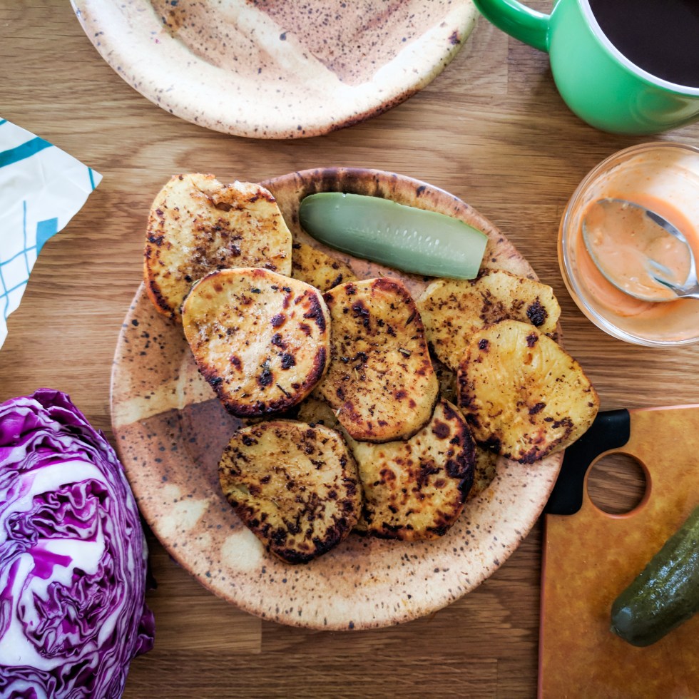 Plate of BBQ grilled sweet potato slices.